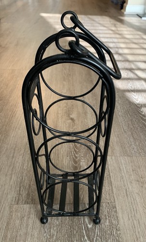 Black metal wine bottle rack