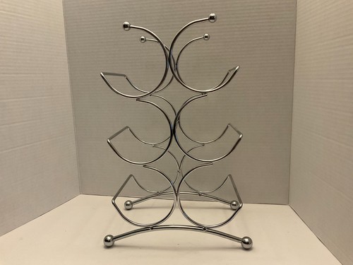 Sculptural chrome metal - chrome, wine